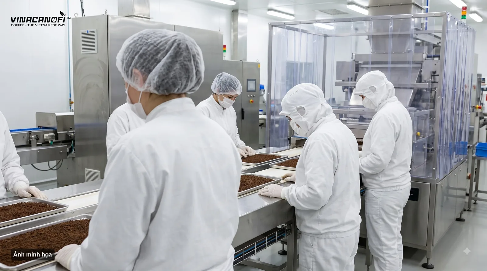 Workers in white protective clothing working along a production line in a factory